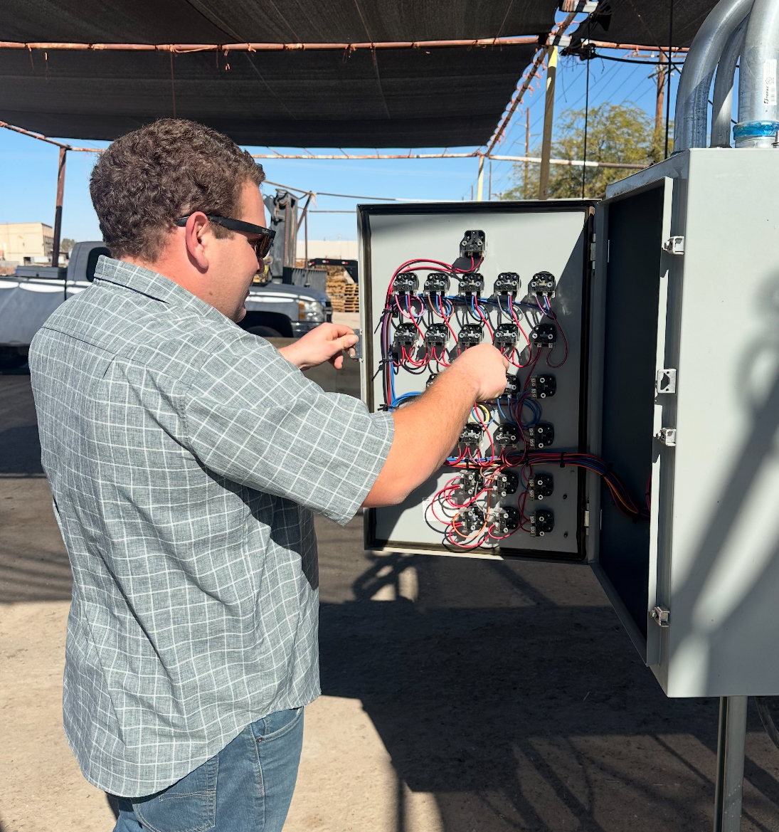 Charlie Babb, owner of Babb Electric, working on an electrical panel